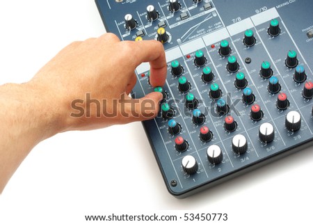Hand and sound mixing console. Element of design.