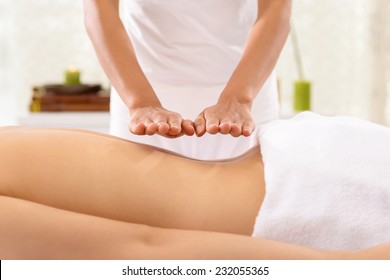 Hand Of Specialist Doing Reiki Treatment To The Woman