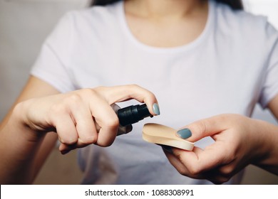 Hand Sponge Foundation Close-up Gray  Background