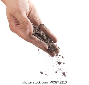 Hand Sprinkling Soil On White Background