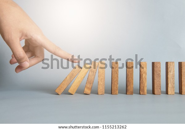 hand stop a dominoes\
continuous toppled