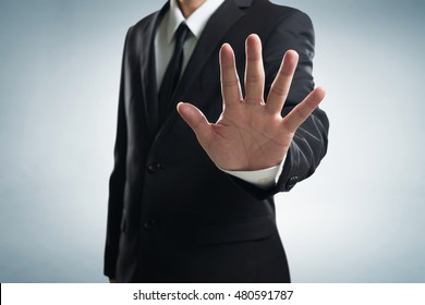 Hand Stop Shown By Businessman.