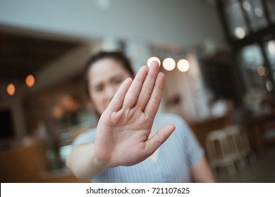 Hand stop from Thai lady. - Shutterstock ID 721107625
