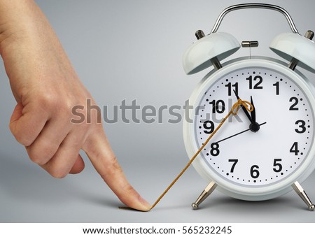 Hand stop time on clock, deadline concept