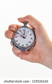 a hand with a stopwatch for timing. isolated white background
