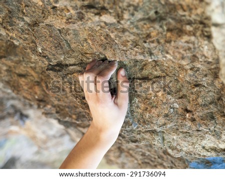 Similar – Little boy looking through the wall of a castle