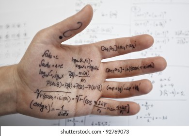 Hand Of Student With Cheat Sheet For Math Exam - Selective Focus