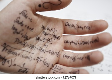 Hand Of Student With Cheat Sheet For Math Exam - Selective Focus