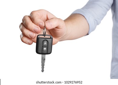 Hand Suggesting Car Key On White Background