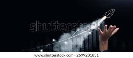 A hand support and launch a rocket, startup, with bar chart, rising arrow, and increasing line. growth, grow, growing finance, success, Entrepreneurship, and business and technology development.