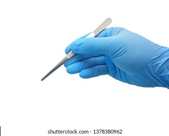 Hand Of Surgeon In Blue Medical Glove Holding A Tweezers Isolated On White Background With Clipping Path