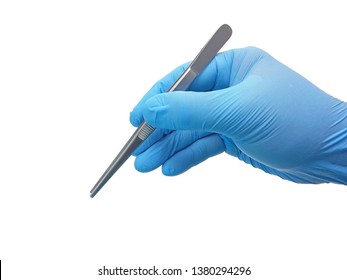 Hand Of Surgeon In Blue Medical Glove Holding A Tweezers Isolated On White Background With Clipping Path