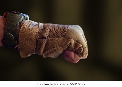 Hand In Tactical Glove And Watch