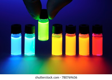 Hand take fluorescent tube - Shutterstock ID 780769636