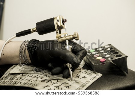 hand tattoo artist holding tattoo machine stock photo edit now