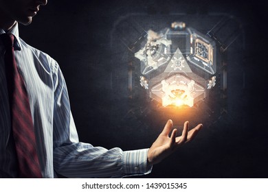 Hand and technology managing concept. Mixed media