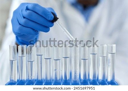 Hand, test tubes and pharmaceutical development for drugs, medicine and medical research. Person, laboratory and discovery for innovation, life extension and professional biochemistry scientist