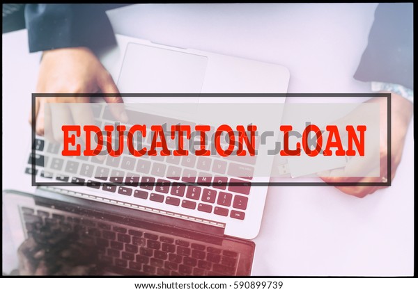 Hand and text  EDUCATION LOAN with vintage\
background. Technology\
concept.