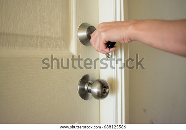 Hand That Unlocking Open Door Knob Stock Photo Edit Now