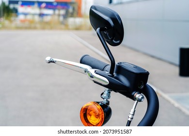 Hand Throttle And Brake Lever Of A Harley-Davidson Motorcycle. Rearview Mirror And Vehicle Turn Signal. Close-up. Nizhny Novgorod, Russia - April 30, 2021