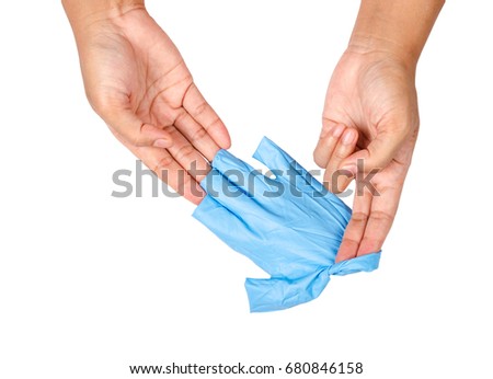 Hand throwing away blue disposable gloves medical, Isolated on white background, Save clipping path. Infection control concept.