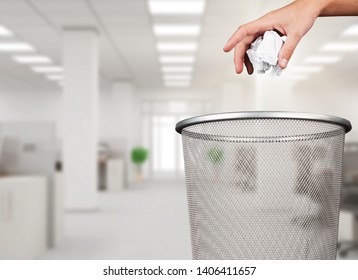 Hand Throwing Out Paper Into Trash Basket Isolated