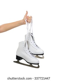 Hand With Thumb Up Sign Holding Woman Ice Skates Isolated On A White Background