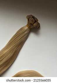 Hand tied weft for hair extensions