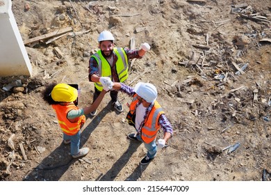 Hand Together Top View. Successful Teamwork Unity. Mechanical Engineer And Construction Team At House Project Underconstruction Site. Hands Meeting Together