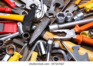 Hand Tool On A Wooden Background