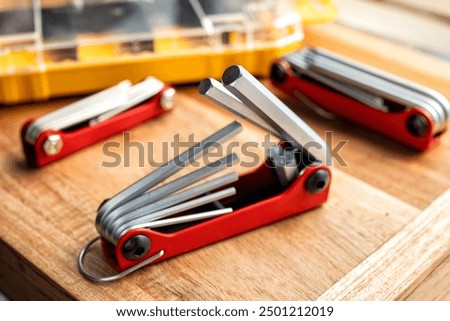 Hand tools,Folding Hex Key Set on desk. Folding Hex Key  design for slipping in pocket or for easy storage.