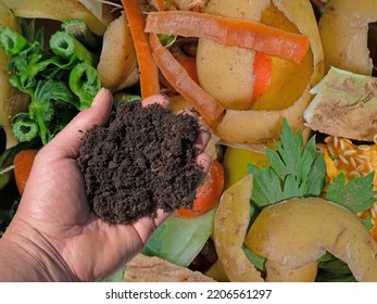 Hand With Topsoil And Biowaste