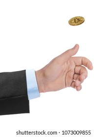 Hand Tossing A Bitcoin Isolated On White Background