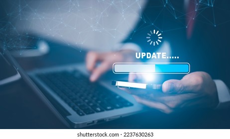 Hand touch bar of Update Software Computer Program Upgrade Business Technology Internet, Update on virtual screen. Internet and technology concept, loading bar with installing the update.