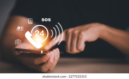 Hand touch button Emergency app in home, call phone, Chat message icon, Emergency application from smartphone for elderly, technology concept.Old hand touch mobile phone and call for help. - Shutterstock ID 2277525315