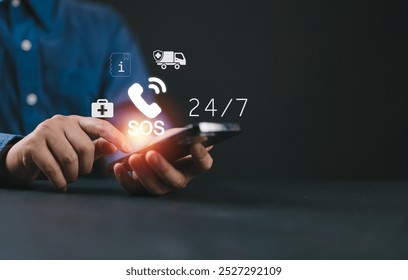 Hand touch button Emergency app in home, call phone, Chat message icon, Emergency application from smartphone for elderly, technology concept.Old hand touch mobile phone and call for help.