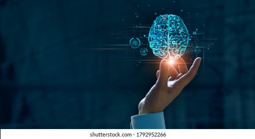 Hand touching brain of AI, Symbolic, Machine learning, artificial intelligence of futuristic technology. AI network of brain on business analysis, innovative and business growth development. - Shutterstock ID 1792952266