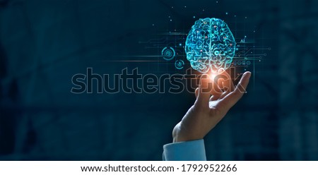 Hand touching brain of AI, Symbolic, Machine learning, artificial intelligence of futuristic technology. AI network of brain on business analysis, innovative and business growth development.