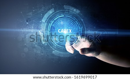 Hand touching CAPEX button, modern business technology concept