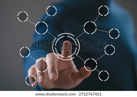Hand touching central node of connected digital network interface. Concept of system integration, data connectivity, network structure, digital ecosystem, technology solution, information management.