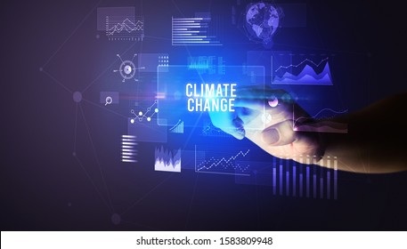 Hand Touching CLIMATE CHANGE Inscription, New Business Technology Concept