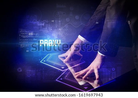 Hand touching digital table with PROXY inscription, new age security concept