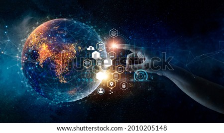 Hand touching earth and global network connection,  Telecommunication communication, Social media and digital marketing, Business data exchanges, Investment, Financial and banking of new era.
