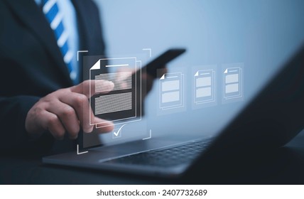 Hand touching to electronic documents to approve document and project concept.Businessman checklist approve online evaluation of business on virtual interface. Communication technology concept.