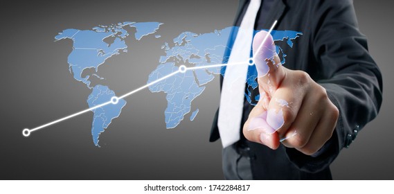 Hand touching a graphs of financial indicator and accounting market economy analysis chart
