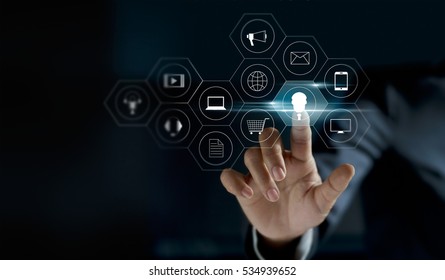 Hand touching icon payments global network connection on dark background, Omni Channel 