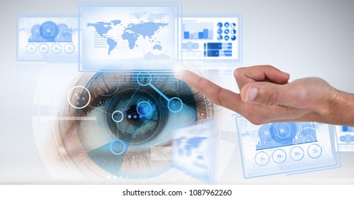 Hand touching and interacting with Image of technology interface panels with eye