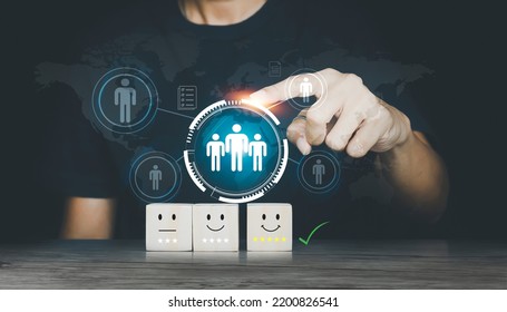 Hand Touching Showing Sad And Happy Smileys On Wooden Cube. Customer Satisfaction. Management To Describe The Selection Of Leaders And Staff. Enterprise Resource Planning ERP