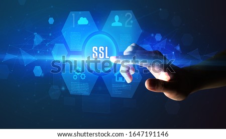Hand touching SSL inscription, new technology concept