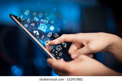 Hand touching tablet pc, social media concept - Powered by Shutterstock